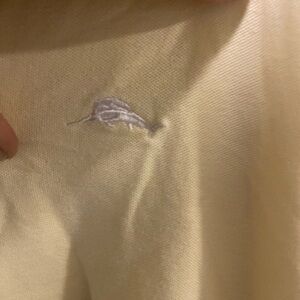 Yellow gently used Tommy Bahama collared shirt